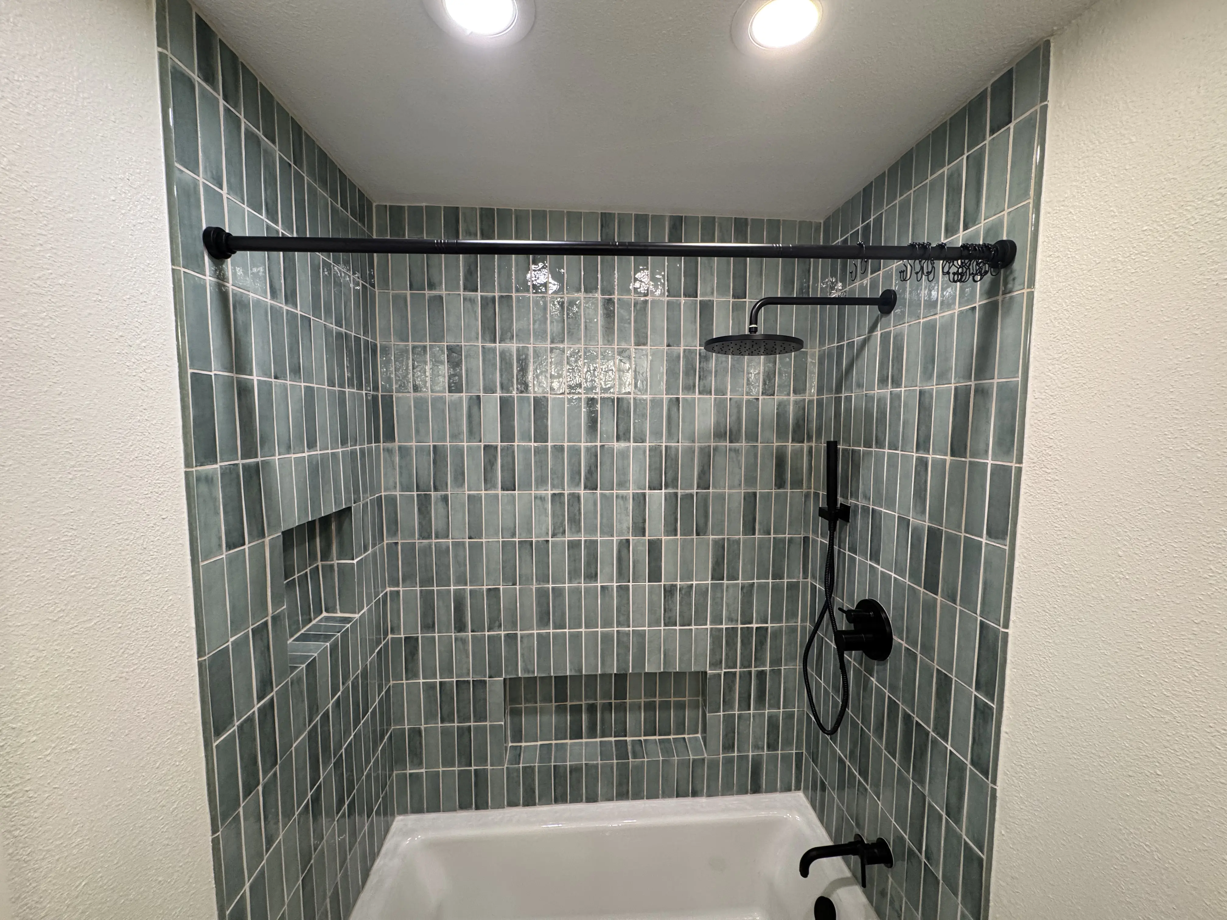 green tile shower niche bench detail