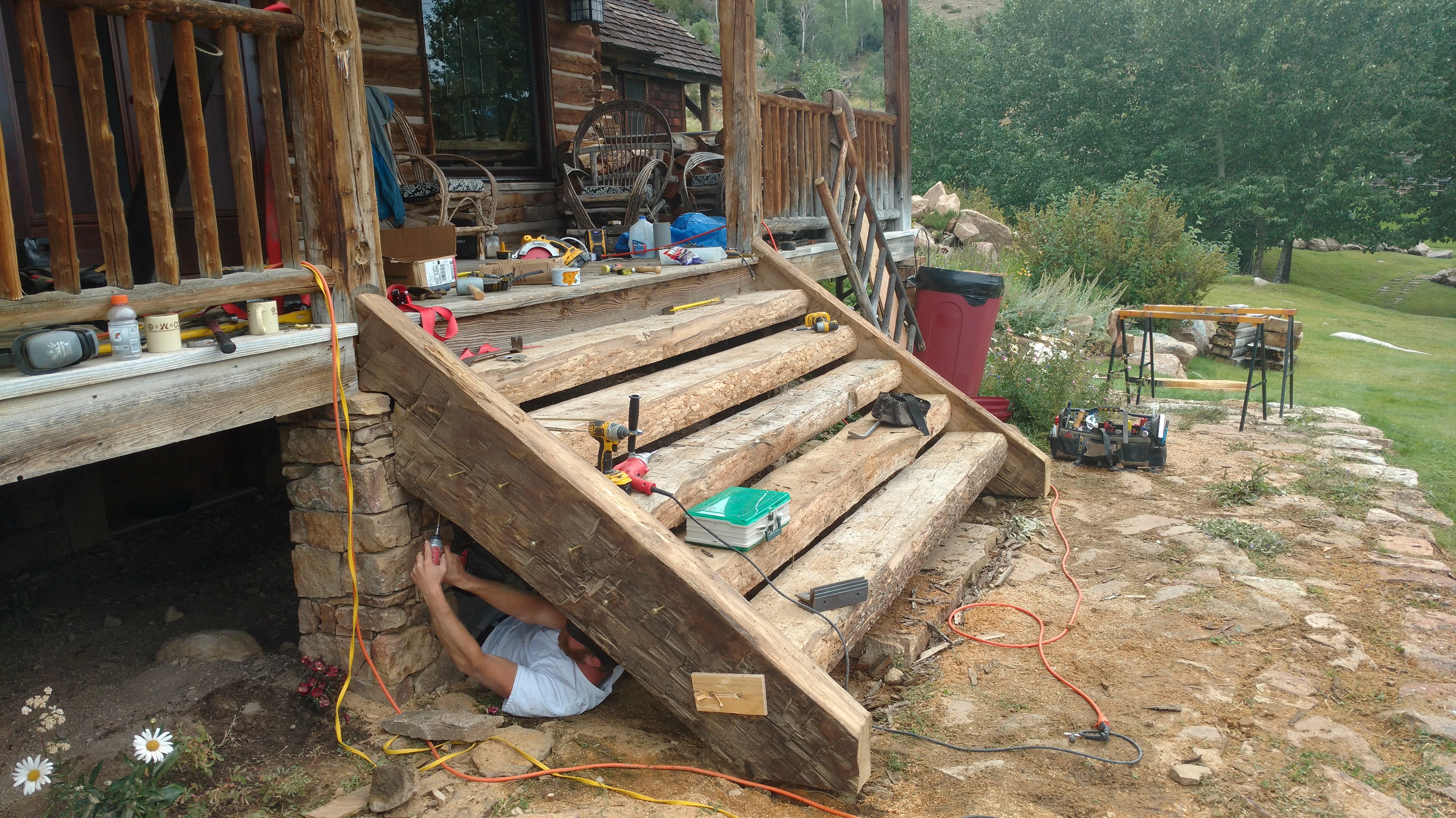 rustic log cabin stair repair